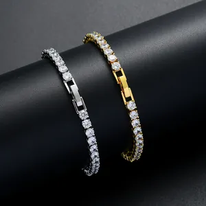 Detalle de pulseras tennis en oro y plata con circonitas y cierre desplegable