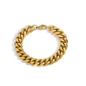 Detail of 12mm gold cuban link chain bracelet showing secure lobster clasp and flat surface