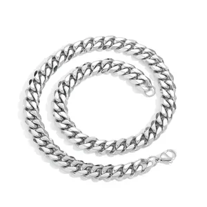 Macro detail of silver 12mm Cuban link chain with a polished lobster clasp closure