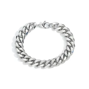 Detailed close-up of 12mm polished silver Cuban link chain with a secure lobster clasp