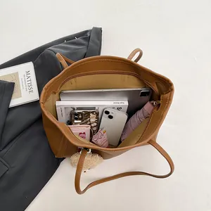 Brown leather JK uniform tote bag with large capacity for daily commuting and laptop
