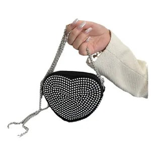 Fashionable heart-shaped black crossbody bag with silver rhinestones and chain strap