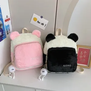Cute plush backpacks in panda and pink styles with soft texture and fur ball pendants