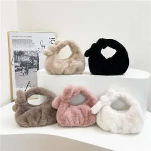 Pluchen tassen van imitatiebont met geknoopte handgrepen in diverse herfstkleuren