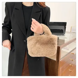 Detailed texture of brown faux fur handbag paired with winter business casual outfit