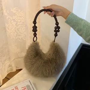 Brown plush faux fur handbag with beaded wooden handle and large capacity U-shape design