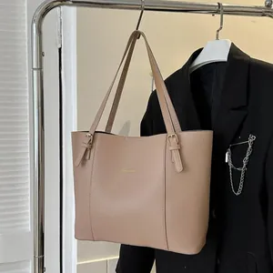 Minimalist large capacity faux leather tote bag in light brown with dual handles