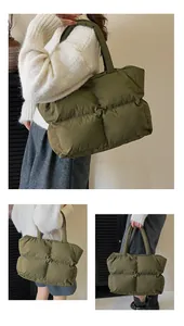 Multiple views showing the puffy texture and army green quilted down tote bag on shoulder