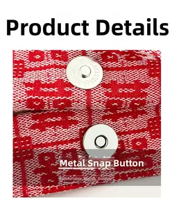 Detail of the high-quality magnetic snap button on the red woven bridal tote bag