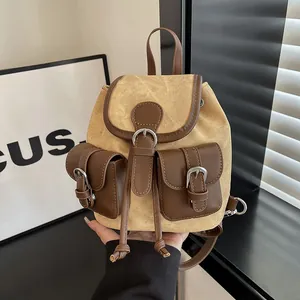 Mini sac à dos vintage en toile beige et cuir marron avec poches avant à boucle