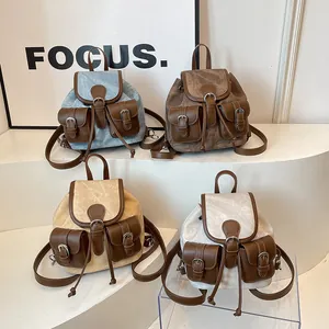 Mini sac à dos rétro pour femmes en bleu clair, marron, kaki et crème en denim