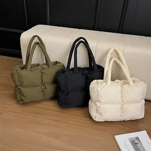 Quilted puffer tote bags in olive green, black, and beige for women's daily commute