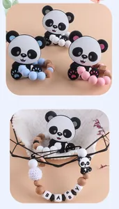 Detail of baby pacifier clip with panda teether, silicone beads and wooden name letters