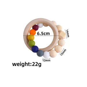 Kreativer Baby-Beißring mit Silikonperlen in Macaron-Farben und Buchenholzring