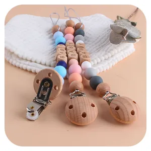 Baby Schnullerketten-Set aus Silikon und Buchenholz mit BABY-Perlen in Morandi-Farben
