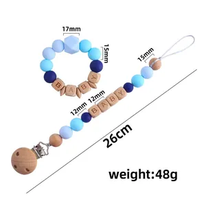 Baby Schnullerkette aus Buchenholz und Silikon Beißring Set mit blauen Perlen