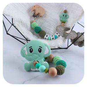 Baby DIY beechwood elephant teether set with mint green silicone beads and pacifier clips