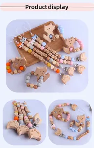 Vue détaillée du jouet de dentition avec anneau chat en hêtre et perles en silicone