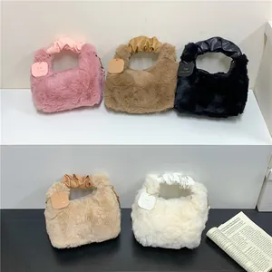 Winter plush handbags in five colors with ruched leather handles and soft faux fur texture