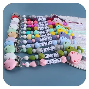 Silicone baby pacifier clips with leaf pendants and baby letter beads in pastel colors