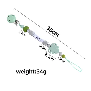 Baby pacifier clip with silicone beads and leaf decoration in morandi colors