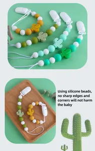 Détail de l'attache-tétine en silicone pour bébé avec perles cactus et clip sûr