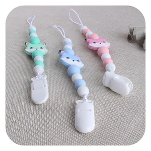 Silicone cat-bead pacifier clips in mint green, blue and pink with cute fox charms