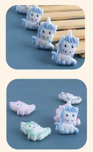 Detailed close-up of colorful silicone unicorn beads for DIY pacifier clips and bracelets