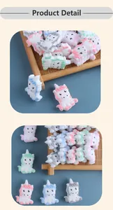 Detailed close-up of cartoon unicorn silicone beads in various pastel colors for DIY crafts