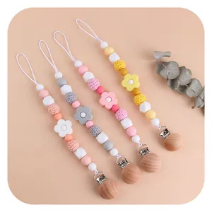 Beech wood and silicone baby pacifier clips set with rose flower beads and wooden clips
