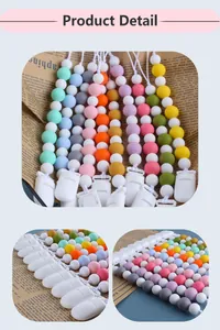 Dettaglio delle perle in silicone per dentizione in vari colori pastello per catenelle ciuccio
