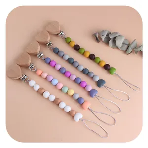 Handmade beech wood heart pacifier clips with colorful silicone beads in 5 pastel colors