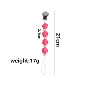 Pink silicone rose baby pacifier clip with silver metal clasp measuring 21cm in length