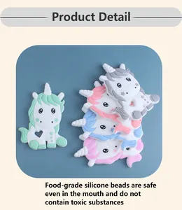 Dettagli del massaggiagengive unicorno in silicone colorato con motivi a cuore e stella