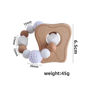 DIY Beißring aus Buchenholz und Silikon mit Perlen und Holzspielzeug in Avocado-Form