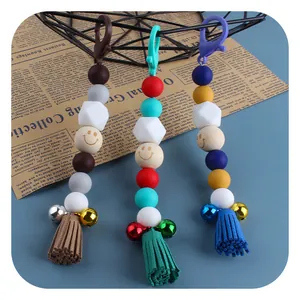 Creative DIY keychain with colorful silicone beads, smile face wooden bead and tassels