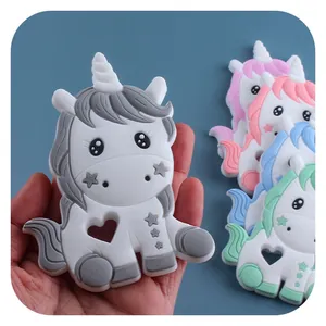 Massaggiagengive in silicone a forma di unicorno con texture a stelle e cuore
