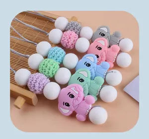Detail of colorful silicone elephant teething beads with crochet accents and cord