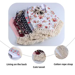Floral flamingo cotton baby bib with decorative tassels and cotton rope strap