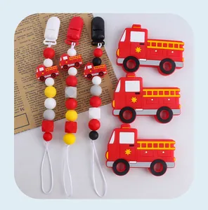Detail of fire truck silicone teether set with colorful beads and pacifier clips