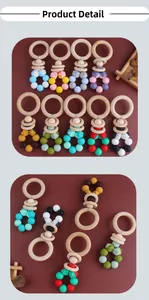 Detail of wooden ring teether with colorful silicone beads for infant soothing