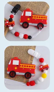 Detail of red fire truck silicone teether with colorful beaded pacifier clip chain