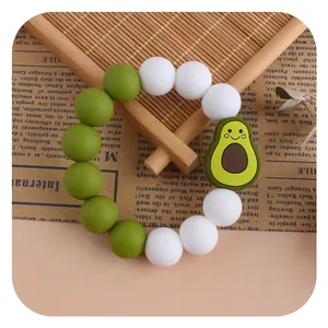 DIY baby silicone teether bracelet with green avocado charm and frosted beads