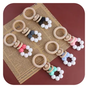 DIY baby teething toy set with natural wood ring and colorful silicone beads in six shades
