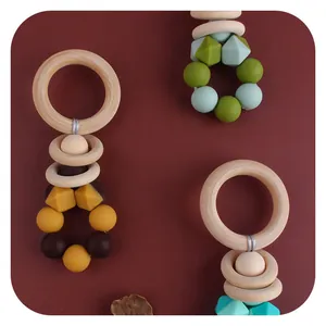 Baby wooden and silicone teether ring with colorful beads for soothing and sensory play