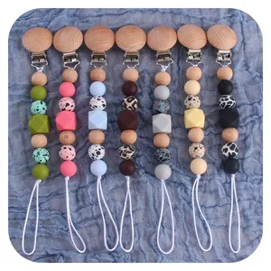 Set of 7 DIY silicone and beech wood pacifier clips with leopard print beads