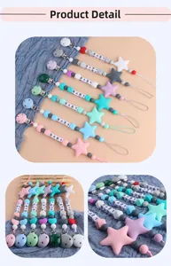 Detailed view of silicone baby pacifier clips featuring star beads and BABY letters