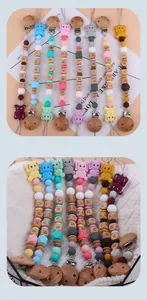 Detail of colorful silicone beads and elephant pendants for baby pacifier clips