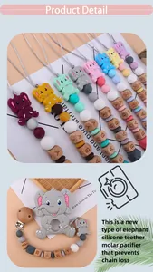 Detail of baby silicone elephant teether with personalized colorful pacifier clip chain