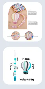 Detail of colorful hot air balloon silicone teether with beaded pacifier clip chain